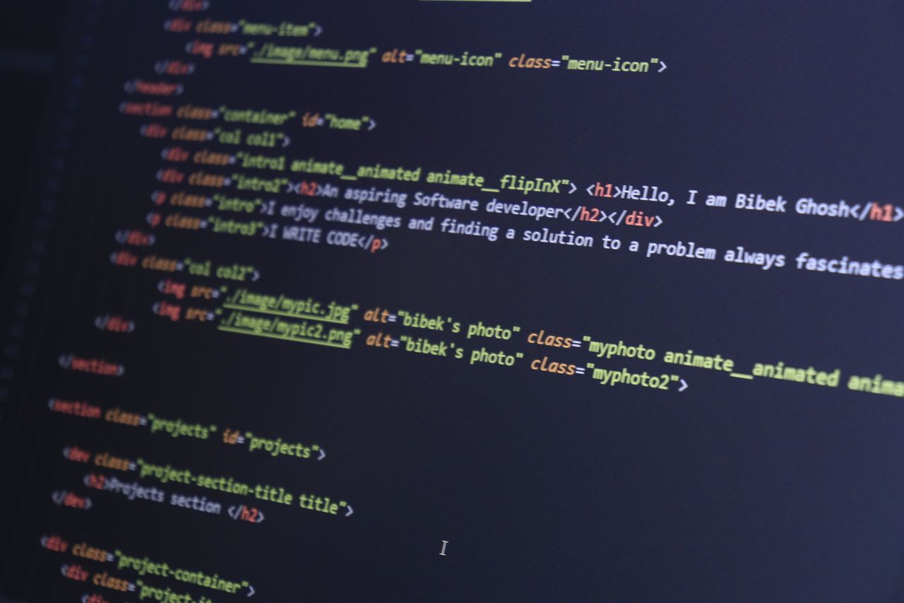 collection-01 Colorful HTML code displayed on a computer screen for programming projects.